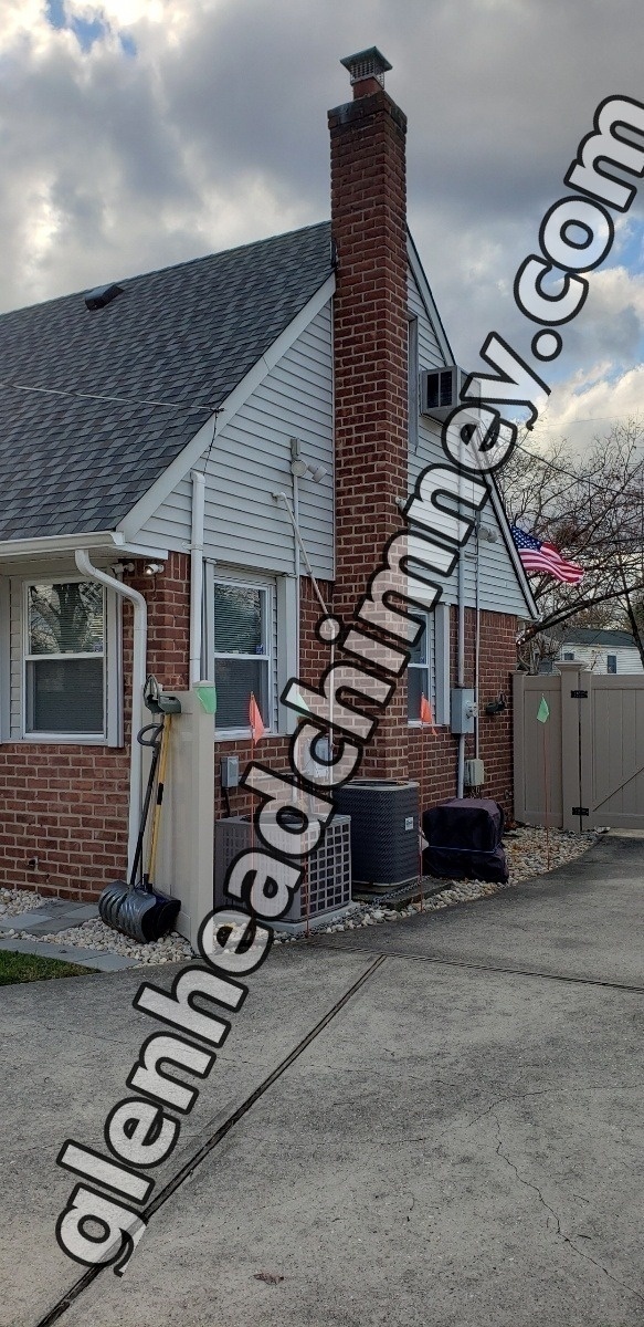 Professional chimney repointing restoring brick joints in Glen Head, NY